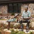 garden decoration metal figure life size bronze old man and girl reading statue
